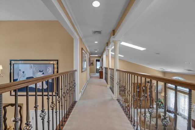 251 Wilmot Dr, Hewlett, NY 11557 - corridor featuring baseboard heating, crown molding, recessed lighting, baseboards, and light colored carpet