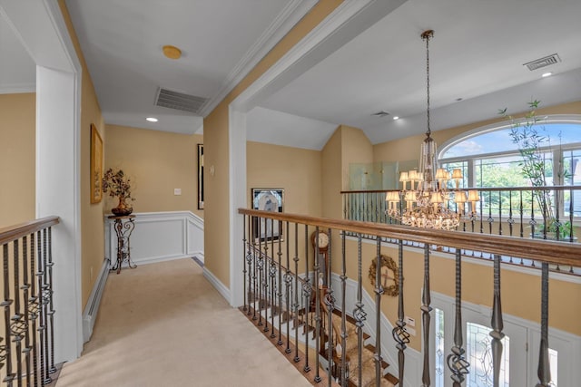 251 Wilmot Dr, Hewlett, NY 11557 - corridor with a chandelier, light colored carpet, baseboard heating, an upstairs landing, and a wainscoted wall