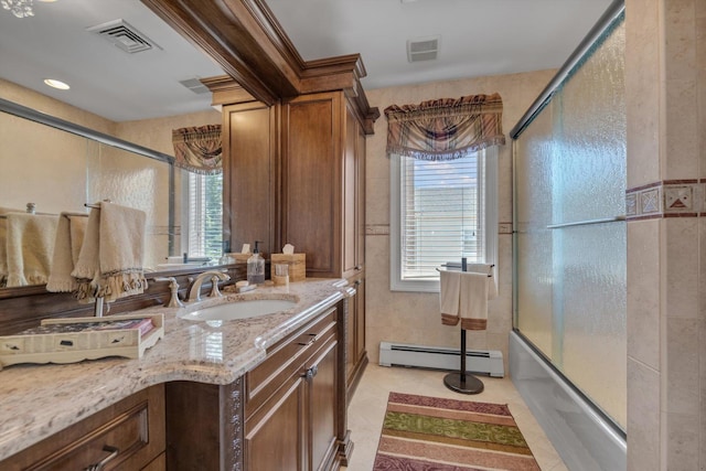 251 Wilmot Dr, Hewlett, NY 11557 - full bathroom featuring a baseboard radiator, vanity, and bath / shower combo with glass door