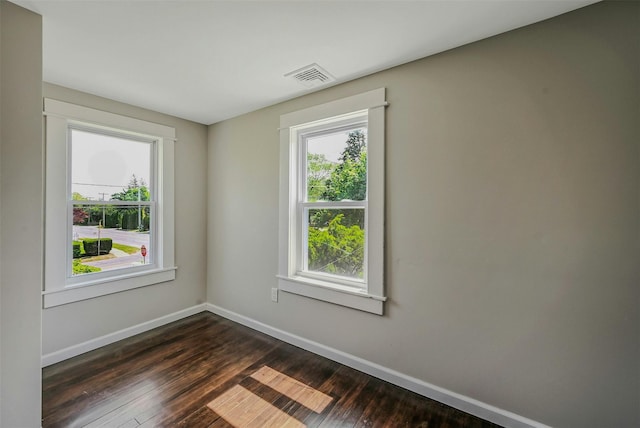 506 Raynor Ave, Riverhead, NY 11901 - empty room featuring baseboards and dark wood finished floors