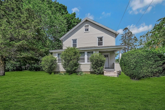 506 Raynor Ave, Riverhead, NY 11901 - back of house with a yard