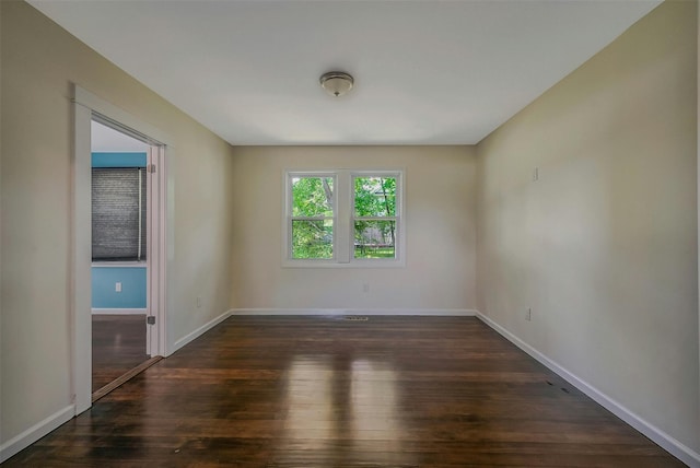 506 Raynor Ave, Riverhead, NY 11901 - empty room with wood-type flooring and baseboards