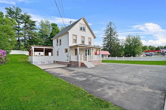 31 Forestburgh Rd, Monticello, NY 12701 - view of front of home featuring covered porch, driveway, roof with shingles, and a chimney