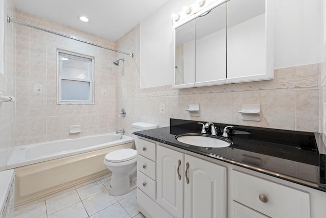 8043 Utopia Pkwy, Jamaica Estates, NY 11432 - full bath featuring tile walls, tile patterned floors, shower / tub combination, vanity, and toilet