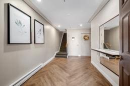 12-08 Robin Ln Unit 11-L, Bayside, NY 11360 - hall with crown molding, baseboards, and recessed lighting