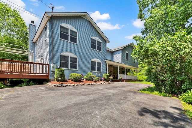 65 Oxford Springs Rd, Chester, NY 10918 - view of front facade featuring a wooden deck and a porch