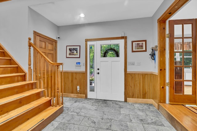 65 Oxford Springs Rd, Chester, NY 10918 - foyer with wainscoting, wood walls, and stairway