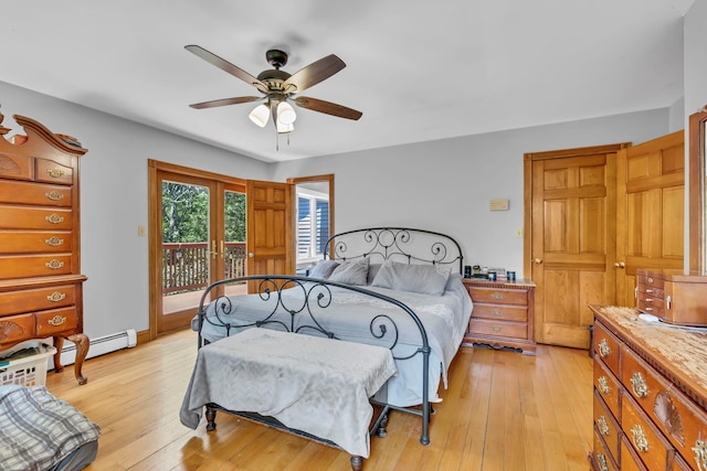 65 Oxford Springs Rd, Chester, NY 10918 - bedroom featuring access to exterior, a baseboard heating unit, light wood finished floors, and ceiling fan