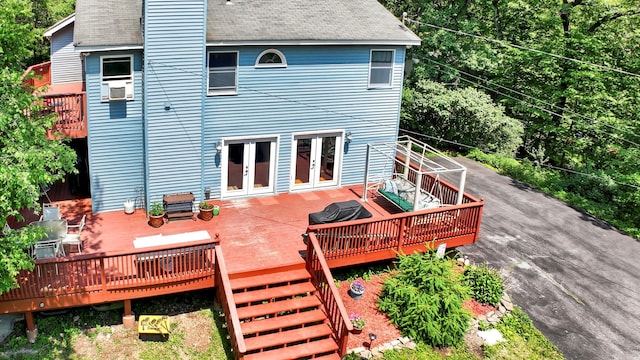65 Oxford Springs Rd, Chester, NY 10918 - rear view of house with roof with shingles, french doors, driveway, and a wooden deck