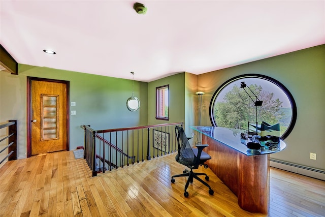 99 Dietz Rd, Jeffersonville, NY 12748 - home office featuring hardwood / wood-style flooring and a baseboard radiator
