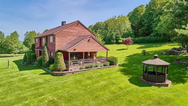 99 Dietz Rd, Jeffersonville, NY 12748 - rear view of house with a gazebo, a chimney, a lawn, a porch, and a shingled roof