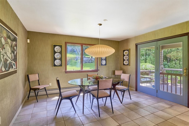 99 Dietz Rd, Jeffersonville, NY 12748 - tiled dining area featuring baseboard heating and baseboards