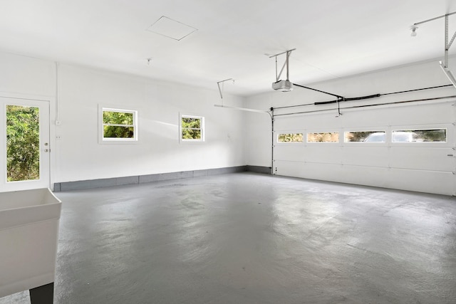 2000 Beebe Dr, Cutchogue, NY 11935 - garage featuring a garage door opener