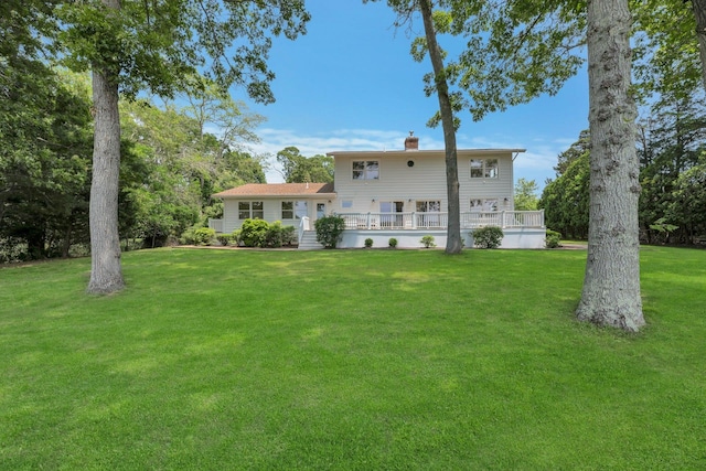 2000 Beebe Dr, Cutchogue, NY 11935 - back of property featuring a chimney and a lawn