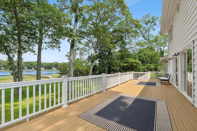 2000 Beebe Dr, Cutchogue, NY 11935 - deck featuring a water view, view of scattered trees, and a lawn
