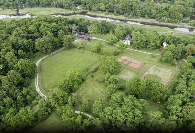 aerial overview of property's location featuring a nearby body of water and rural landscape