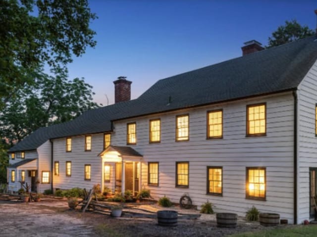 view of front of property featuring a chimney