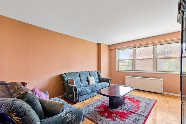 102-30 66th Rd Unit 4B, Forest Hills, NY 11375 - living area with radiator and baseboards