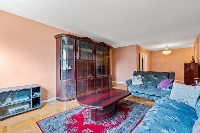102-30 66th Rd Unit 4B, Forest Hills, NY 11375 - living area featuring a chandelier and baseboards