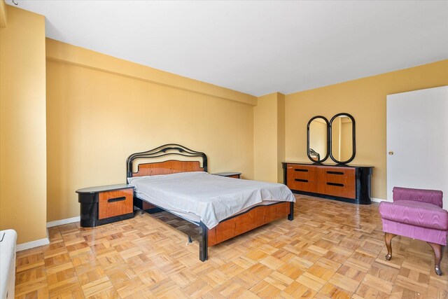 102-30 66th Rd Unit 4B, Forest Hills, NY 11375 - bedroom featuring baseboards