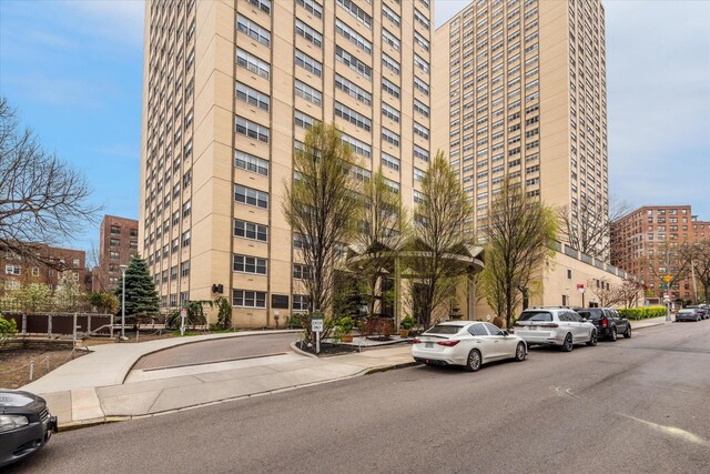 102-30 66th Rd Unit 4B, Forest Hills, NY 11375 - view of building exterior featuring a city view