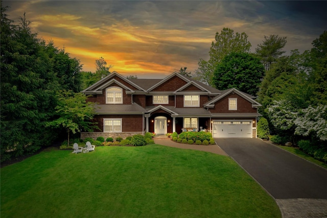 15 Elm Ln, Manhasset, NY 11030 - craftsman-style house with driveway, a lawn, and stone siding