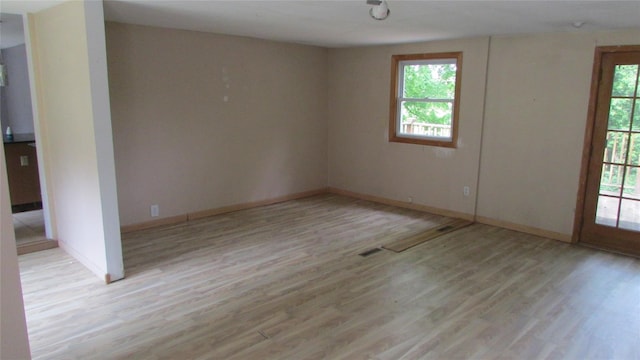 231 Lakeview Rd, Wappingers Falls, NY 12590 - unfurnished room featuring wood finished floors, healthy amount of natural light, and baseboards