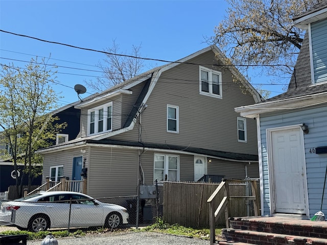 44 Chapman Pl, Bay Shore, NY 11706 - view of property exterior featuring a gambrel roof