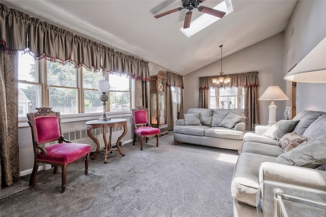30 W 12th St, Huntington Station, NY 11746 - living room with ceiling fan, vaulted ceiling, carpet, plenty of natural light, and a chandelier