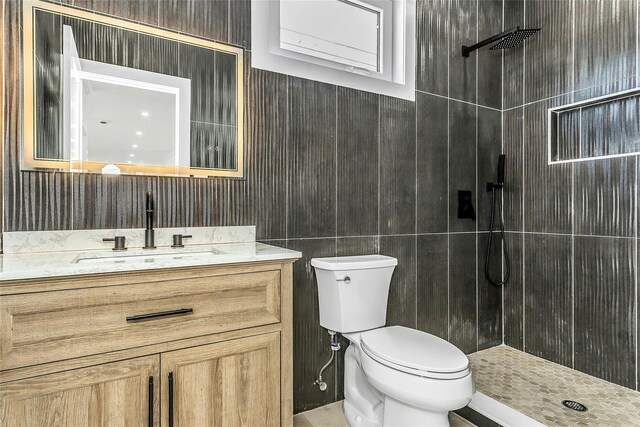 9 Vista Ln, Levittown, NY 11756 - bathroom with vanity, toilet, and tiled shower