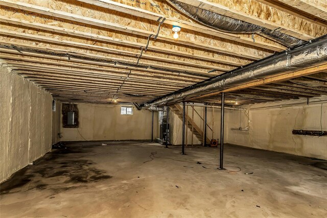 9 Vista Ln, Levittown, NY 11756 - basement featuring electric panel and stairway