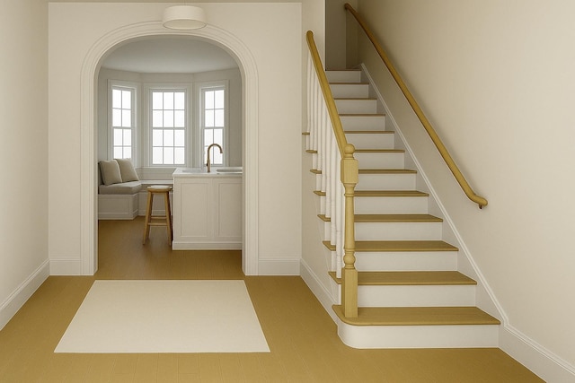 8 Newburgh Rd, Patterson, NY 12563 - staircase with arched walkways and baseboards