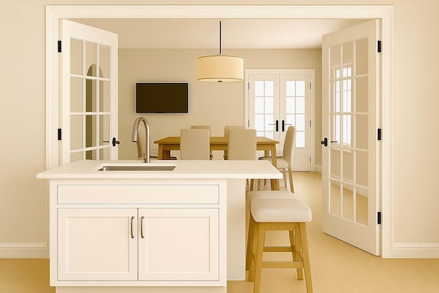 8 Newburgh Rd, Patterson, NY 12563 - kitchen with a sink, baseboards, light countertops, and french doors