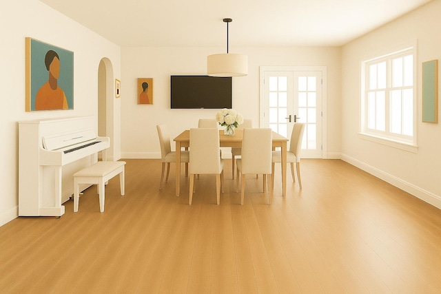 8 Newburgh Rd, Patterson, NY 12563 - dining space with light wood finished floors, baseboards, and arched walkways