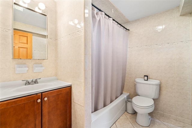 402 Chelsea Ave, West Babylon, NY 11704 - bathroom with tile walls, tile patterned floors, vanity, shower / bathtub combination with curtain, and toilet