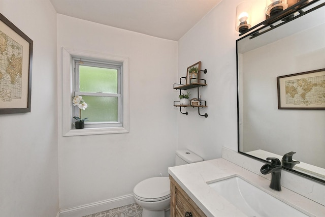 46 Gilbert St, Northport, NY 11768 - half bath with toilet, vanity, and baseboards