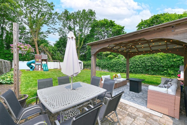 46 Gilbert St, Northport, NY 11768 - view of patio with outdoor lounge area, a playground, a gazebo, and outdoor dining space