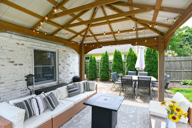 46 Gilbert St, Northport, NY 11768 - view of patio / terrace featuring an outdoor living space, a gazebo, and outdoor dining area