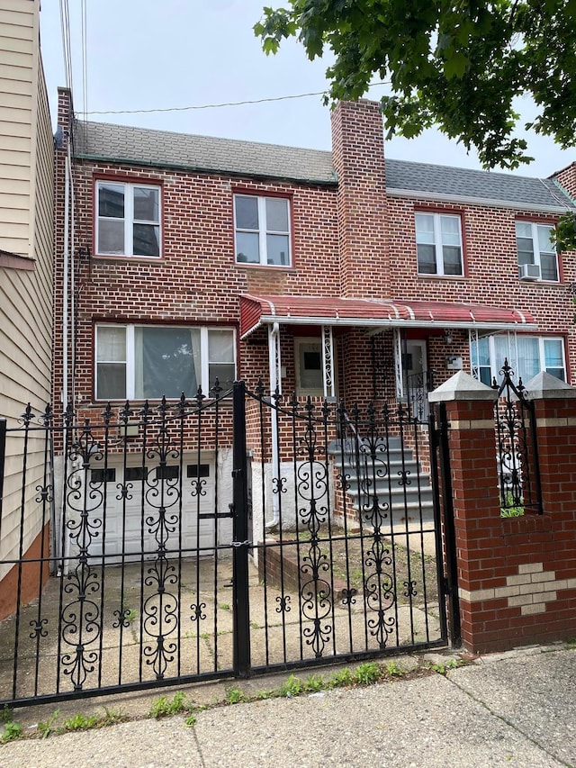 644 Autumn Ave, Brooklyn, NY 11208 - multi unit property featuring brick siding, a fenced front yard, and roof with shingles