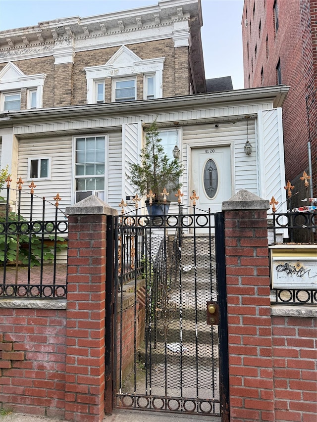 41-20 Elbertson St, Elmhurst, NY 11373 - gate featuring a fenced front yard