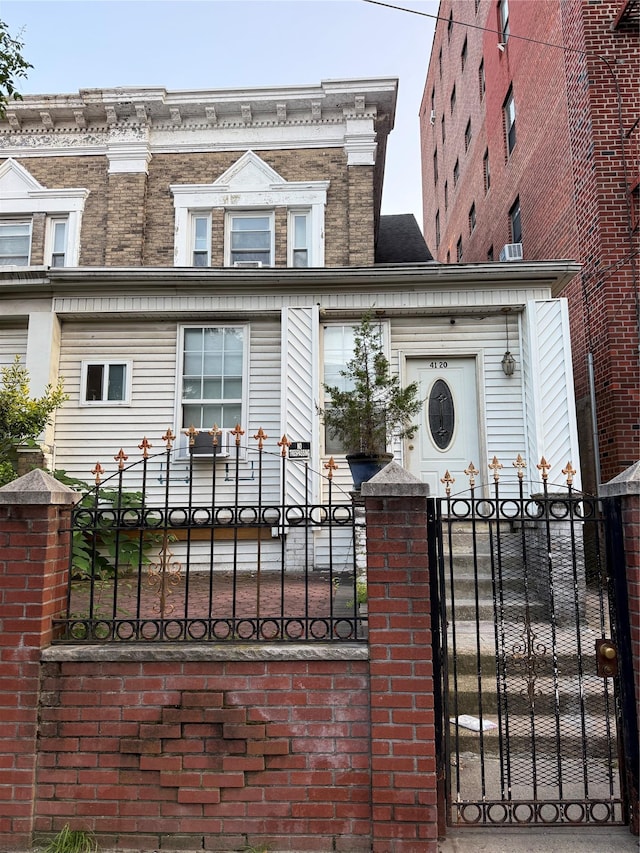 41-20 Elbertson St, Elmhurst, NY 11373 - view of front of home with a fenced front yard