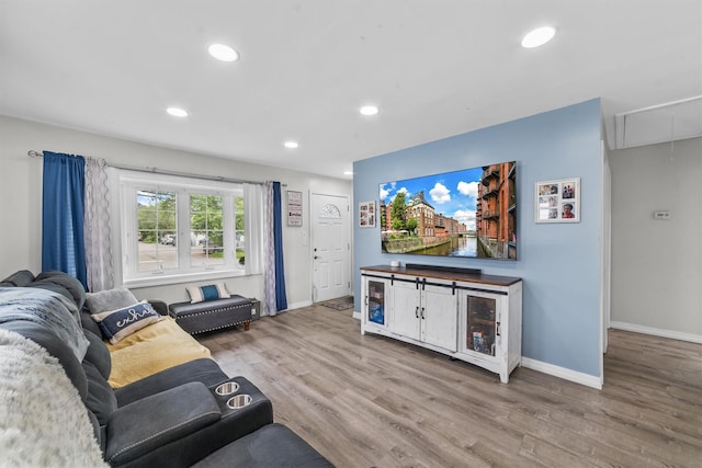 226 Mile Square Rd, Yonkers, NY 10701 - living area featuring attic access, baseboards, wood finished floors, and recessed lighting