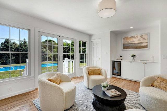2850 Reeve Rd, Mattituck, NY 11952 - living room with wine cooler, plenty of natural light, light wood-type flooring, and recessed lighting
