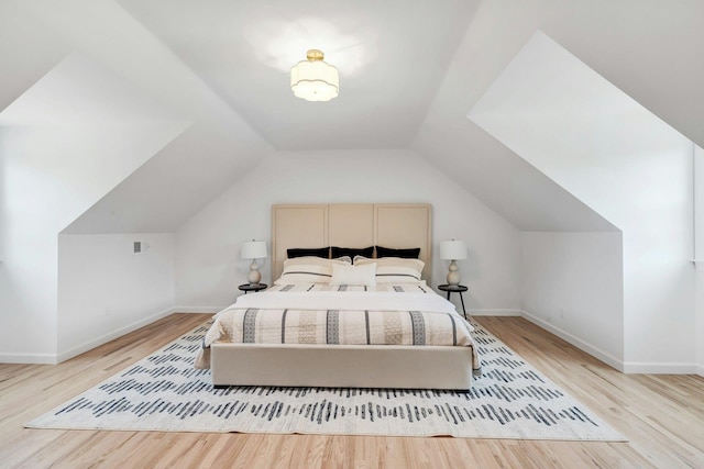 2850 Reeve Rd, Mattituck, NY 11952 - bedroom featuring wood finished floors and lofted ceiling