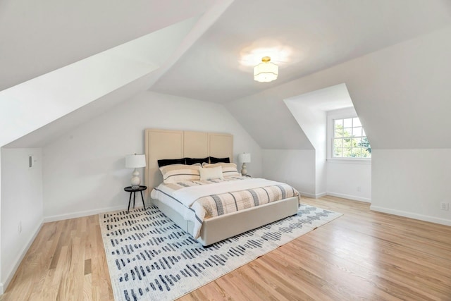 2850 Reeve Rd, Mattituck, NY 11952 - bedroom featuring light wood-style floors and lofted ceiling