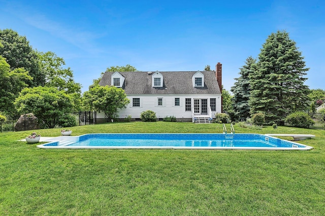 2850 Reeve Rd, Mattituck, NY 11952 - back of property with an outdoor pool and a chimney