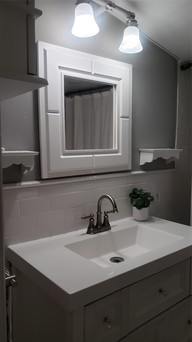 1026 Logan Ave, Bronx, NY 10465 - full bath with vanity, decorative backsplash, and tile walls