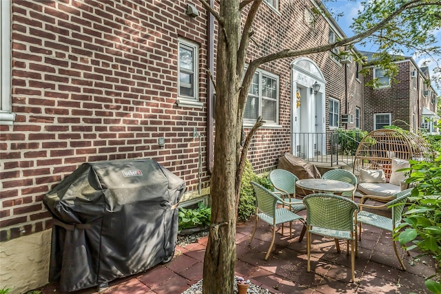 249-14 57th Ave Unit 259, Little Neck, NY 11362 - view of patio with a grill