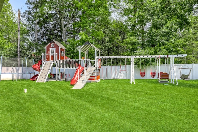 21 Dale Rd, Monsey, NY 10952 - view of play area with a trampoline and view of wooded area