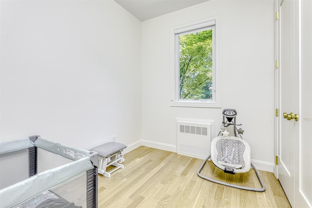 21 Dale Rd, Monsey, NY 10952 - living area with radiator heating unit, light wood finished floors, and baseboards
